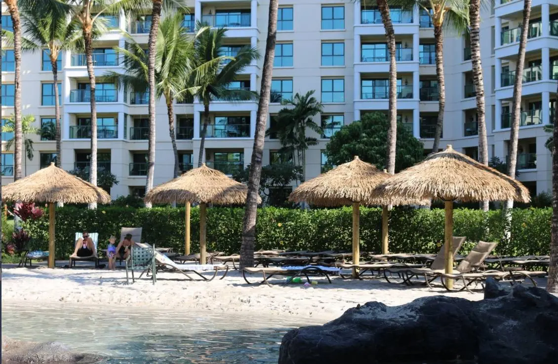 Thatch umbrellas at a resort in hawaii