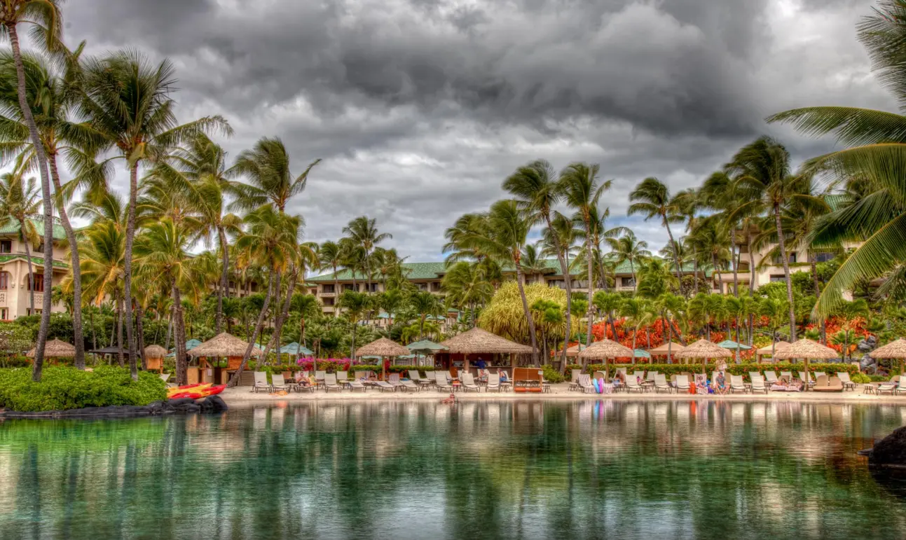Thatch umbrellas at resort beach area