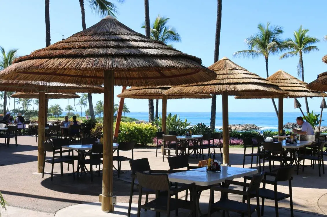 viro reed umbrellas around an outdoor seating area