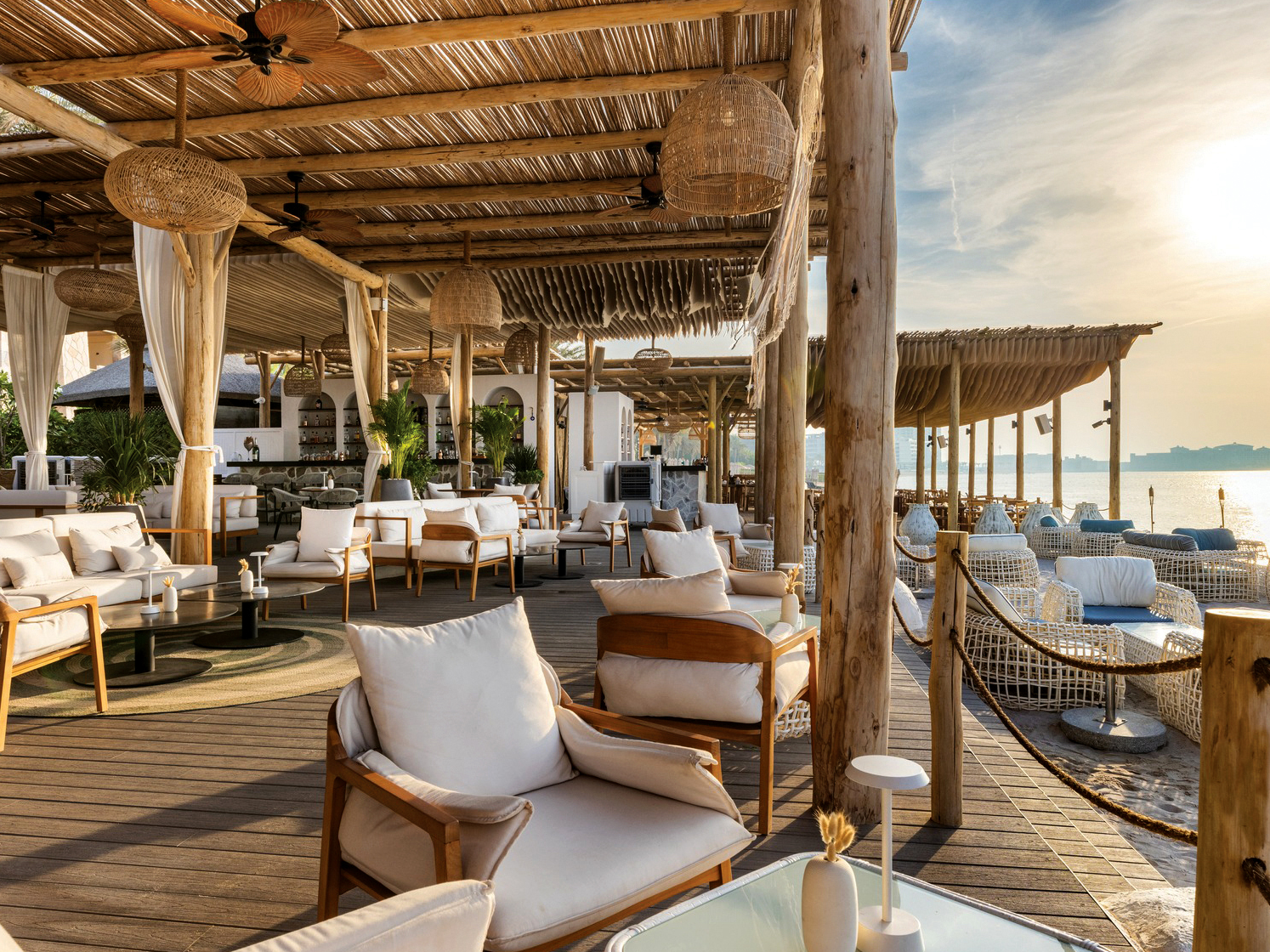 Commercial Project for a restaurant by the sea using eucalyptus awnings for ceiling treatment